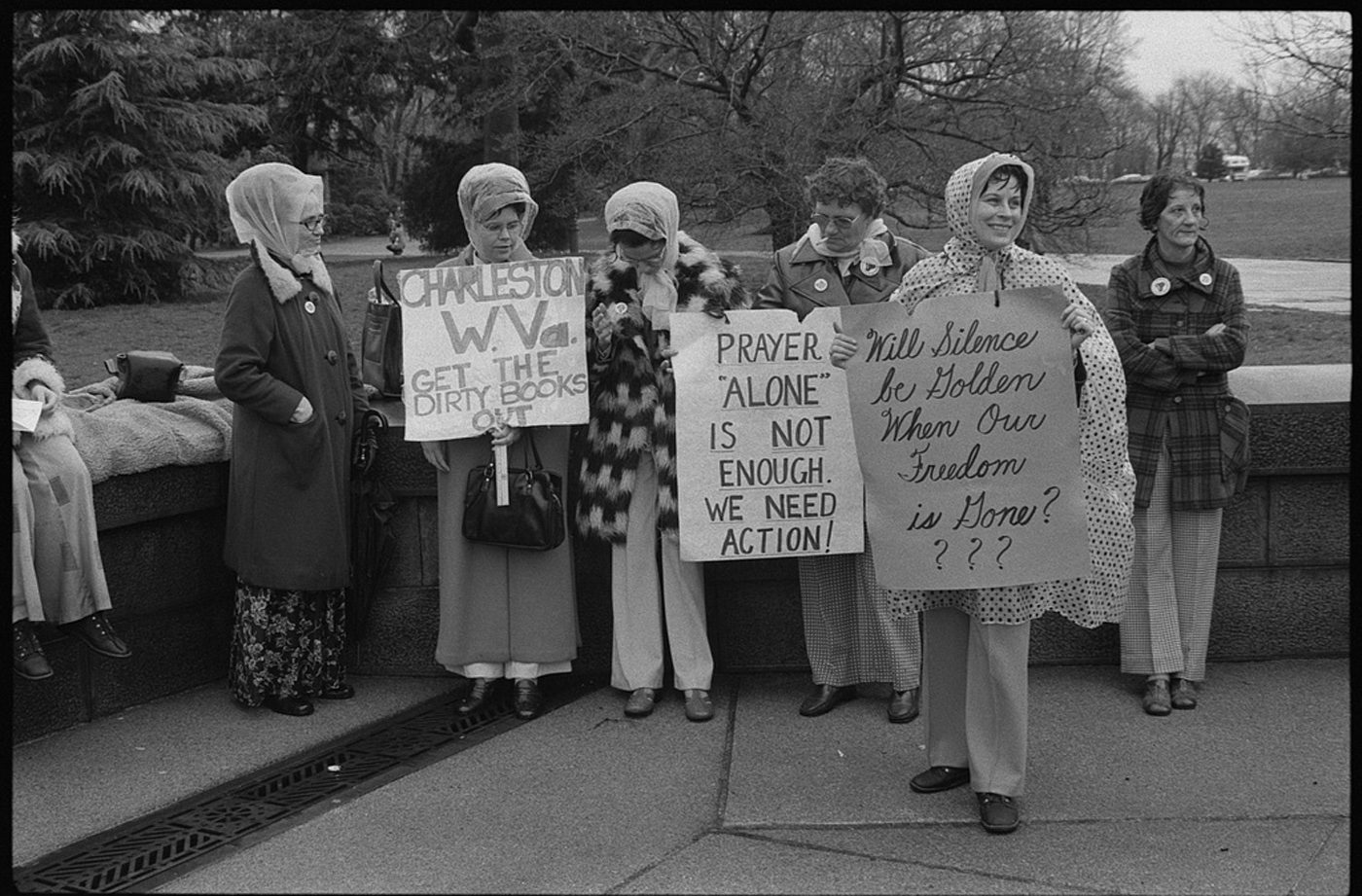 Women from Boston, Massachusetts and Charleston, West Virginia demonstrate, protesting busing and textbooks, in Washington D.C. in March 1975. Photo from the Library of Congress.