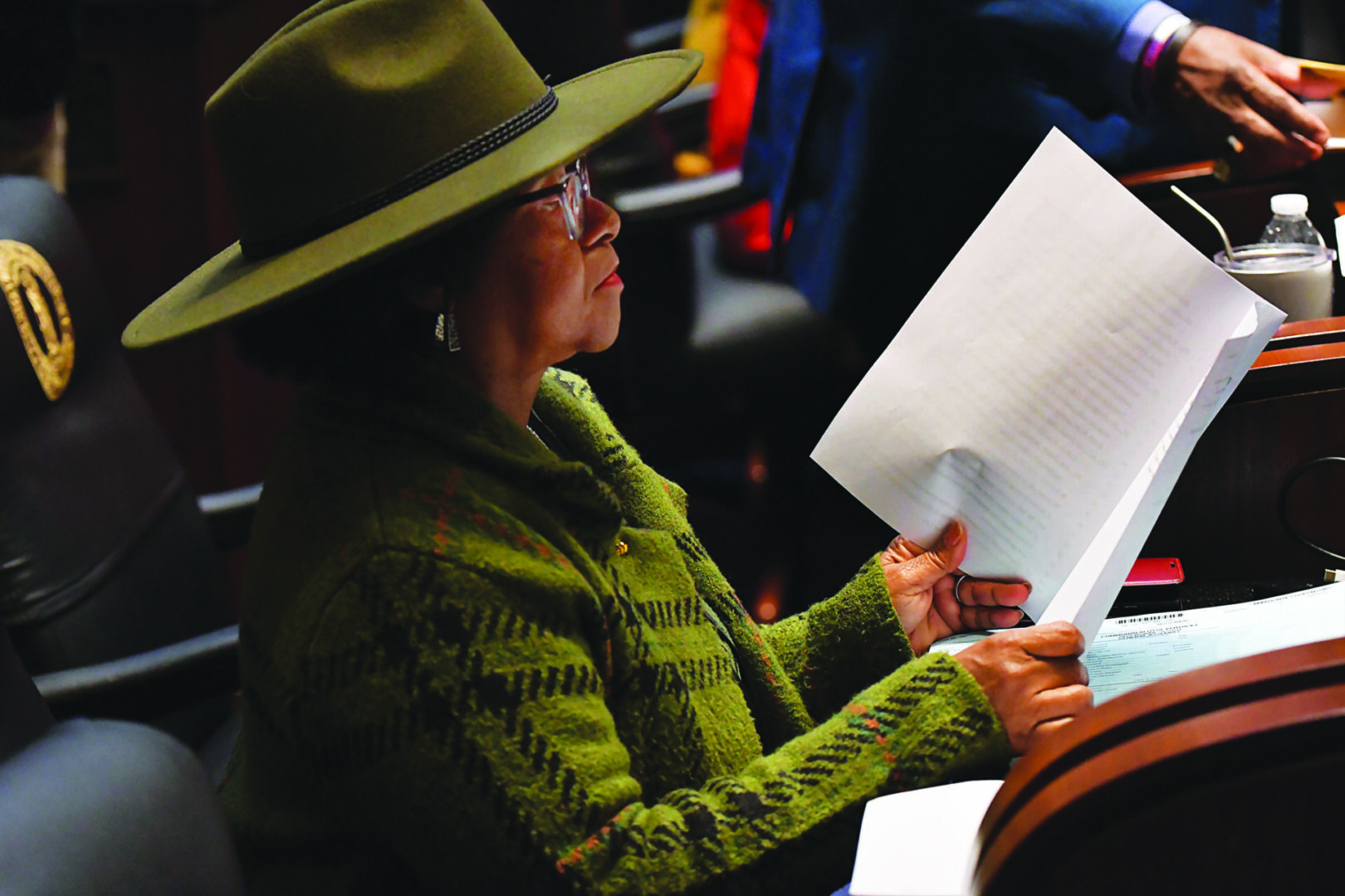 State Rep. Beverly Chester-Burton, D-Shively, looks over a bill on the House floor on Feb. 5. Photo: Legislative Research Commission