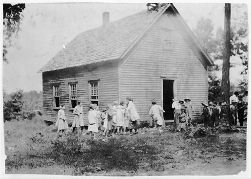 Children play outside Hickory Grove School in Rockcastle County in August 1916. This photo, shot by photographer Lewis Wickes Hine (1874-1940) is in the collection of the Library of Congress.